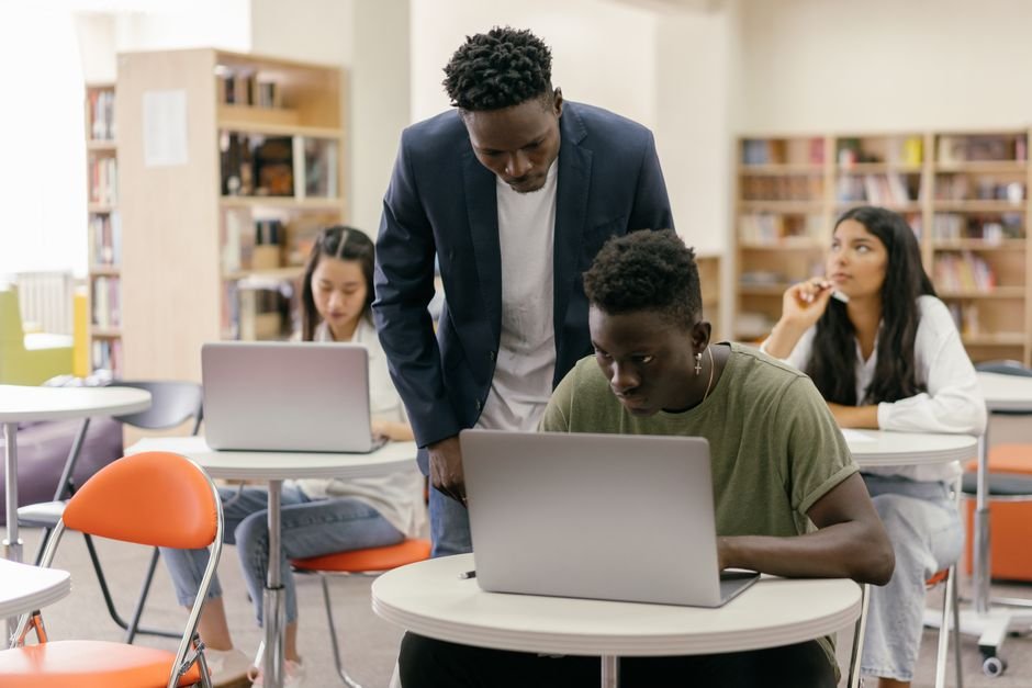 Student working at a laptop, the audience Handshake AI recruits from
