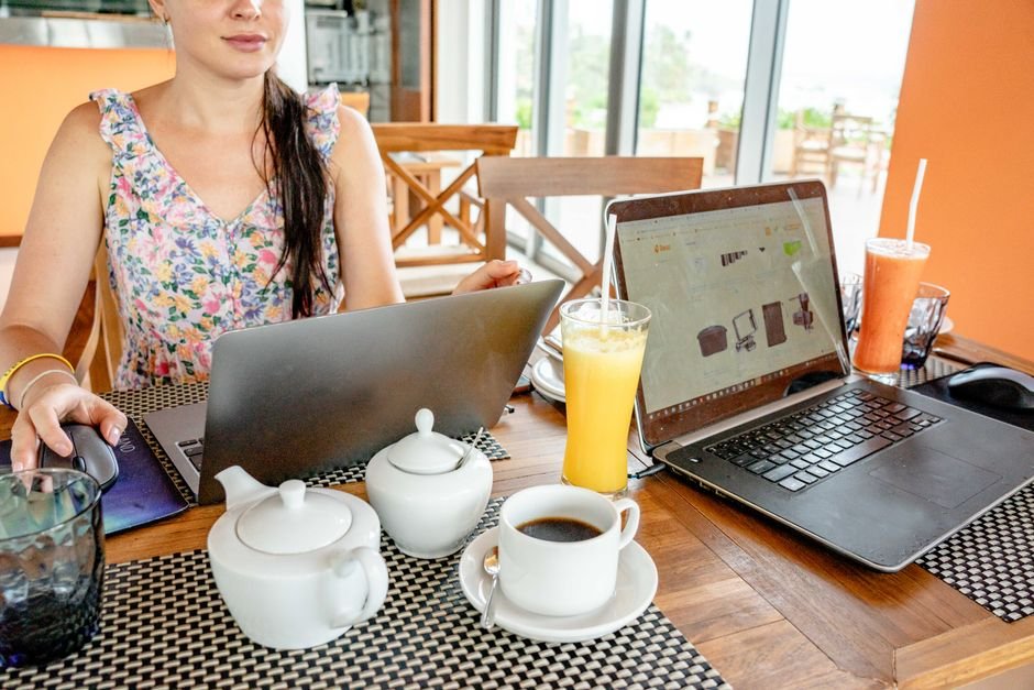 A laptop on a desk in a home workspace