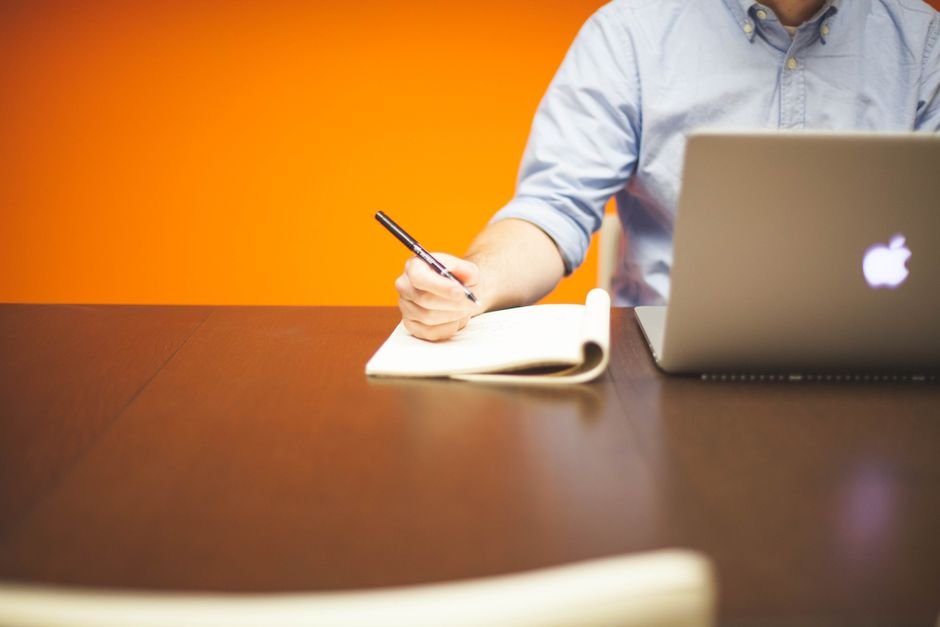 A freelance annotator working at a laptop